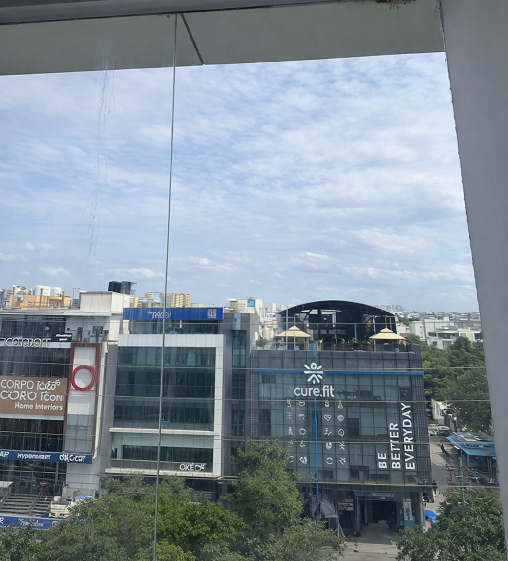 After — crystal clear restored glass facade Bangalore